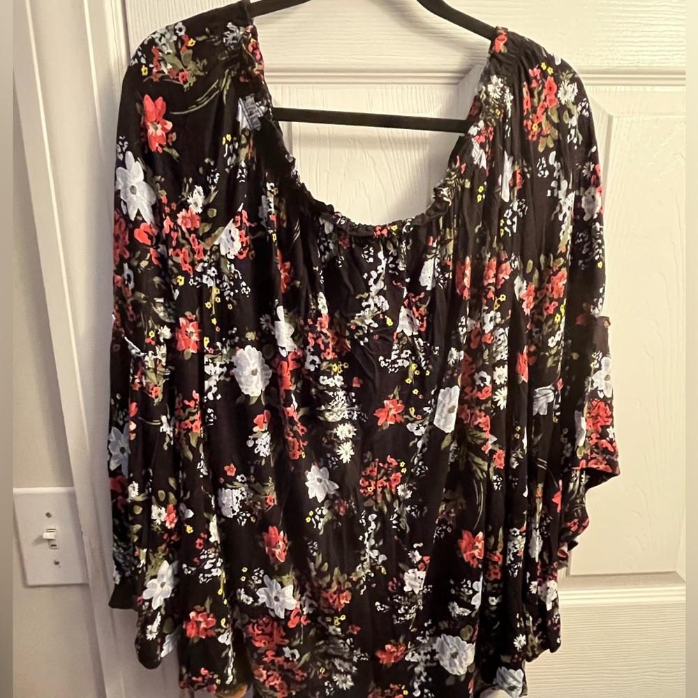 Black blouse with flowers and bell sleeves